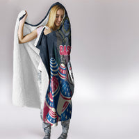 Navy hooded blanket with bunny Easter egg print, woman holding the hood edge