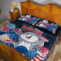 Blue quilt bed set with patriotic bunny design and red-white striped accent pillows