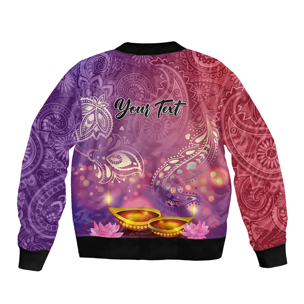 Unisex purple bomber jacket, back view, ribbed hem and sleeves with candlelit paisley print