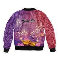 Unisex purple bomber jacket, back view, ribbed hem and sleeves with candlelit paisley print