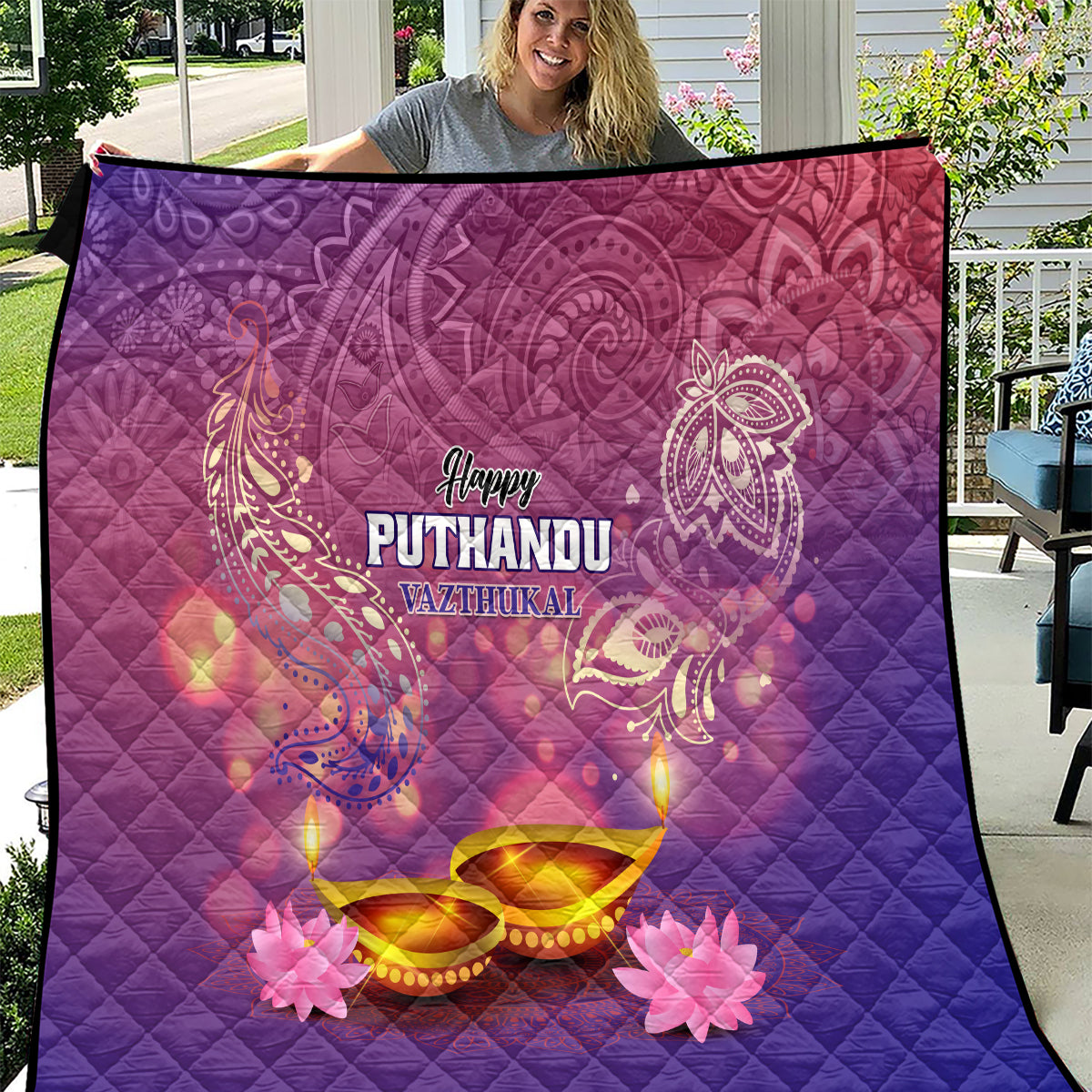 Purple quilt with “Happy Puthandu Vazthukal” and festive lamp, lotus and ribbon print