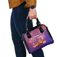 Purple shoulder handbag with black strap and top handles, glossy festive print.