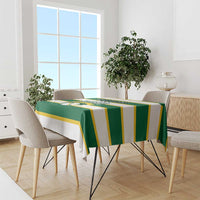 Green and yellow striped rugby tablecloth on dining table with chairs