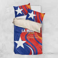 Blue and red Chile bedding set with white stars and centered text logo, two pillowcases.