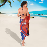 Chile football sarong in red and blue flag print, worn as beach wrap at back view