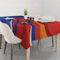 Red Chile football tablecloth with blue and gold vertical stripe pattern on dining table