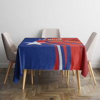 Red Chile football tablecloth with blue star and red stripe graphics on dining table