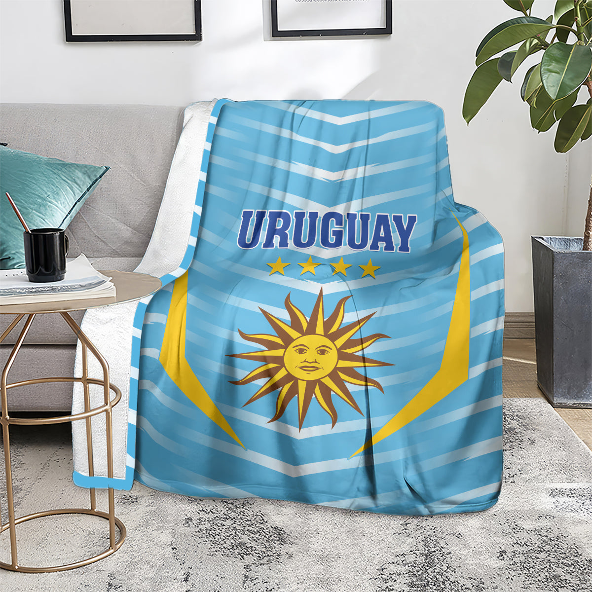 Uruguay football blanket on armchair, light blue chevrons with sun emblem and yellow flag