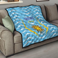 Light blue Uruguay football quilt on a sofa, 'URUGUAY' and sun emblem with stars
