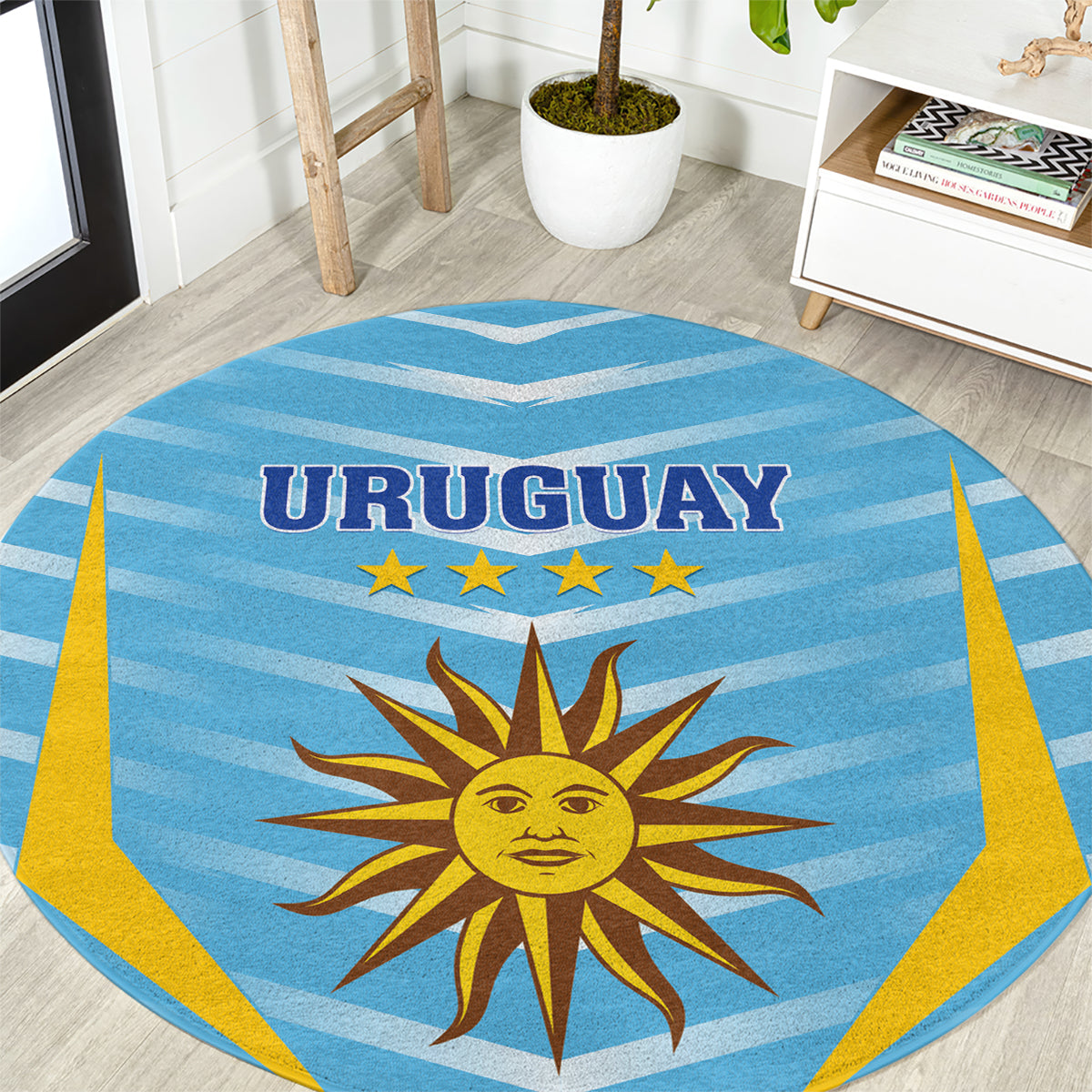 Round blue Uruguay football carpet with sun emblem and yellow border rays