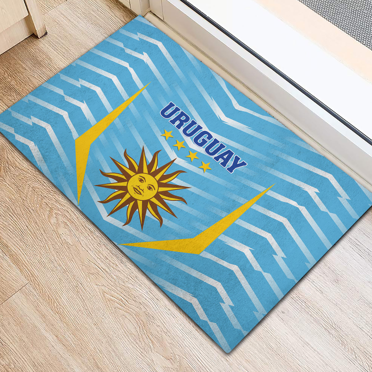 Blue rubber doormat with Uruguay text, sun emblem, and star accents