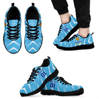 Light blue lace-up football sneakers with Uruguay crest, black sole