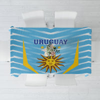 Uruguay-themed football tablecloth, blue field with “URUGUAY” text, sun emblem, flags.