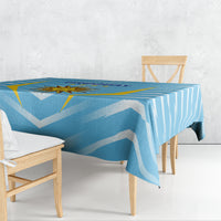 Uruguay-themed football tablecloth in blue with gold star-and-sun design and chevron stripes.
