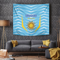 Uruguay blue football tapestry hanging on wall with 'URUGUAY' and sun crest design