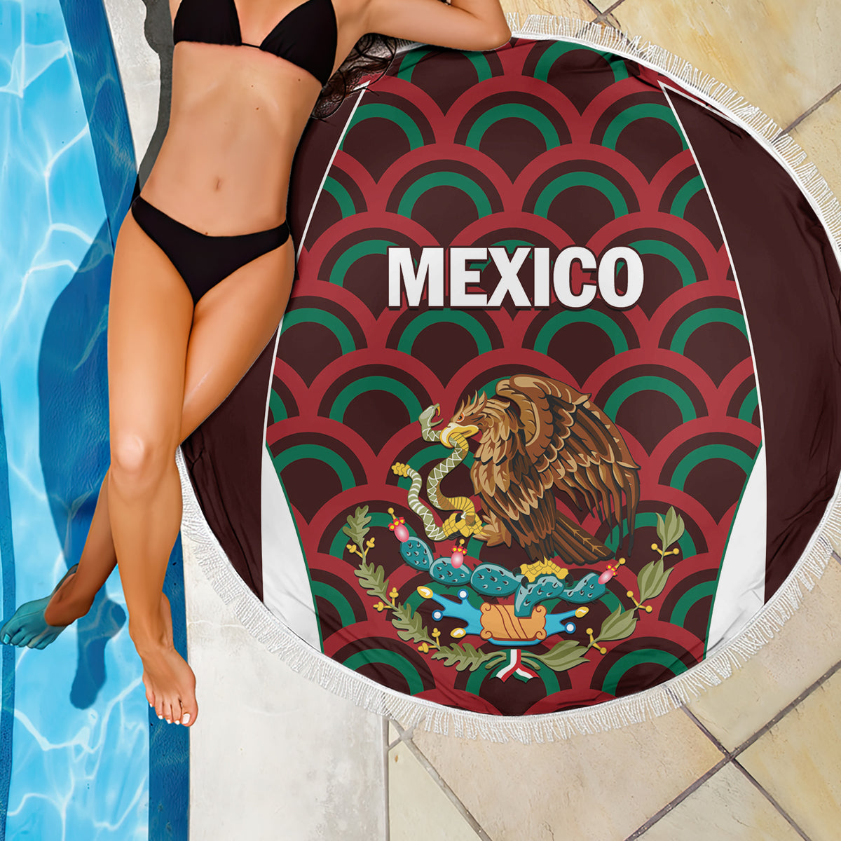 Round fringed beach blanket close-up with Mexico text and eagle graphic