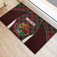 Mexico rubber doormat showing “MEXICO” over a teal red wave pattern with lion emblem