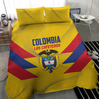 Yellow football bedding set with duvet and two pillowcases featuring Colombia crest and text