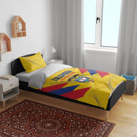 Yellow football bedding set on bed with duvet and pillowcases, Colombia crest and stripes