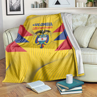 Colombia football blanket in yellow with blue and red diagonal stripes, crest and text