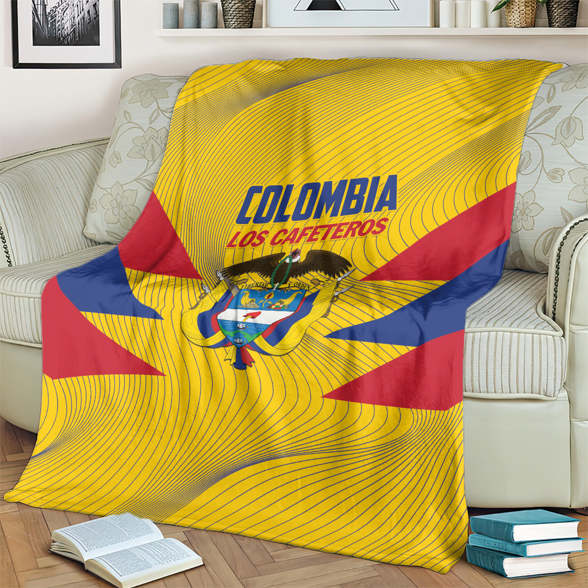 Colombia football blanket draped on sofa, yellow with blue/red diagonals and crest text