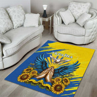 Blue and yellow area rug with gold dove emblem and bold sunflower and wing design
