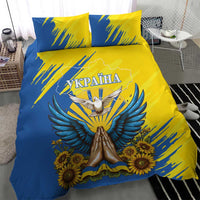 Blue and yellow bedding set with Ukraine map, dove, wings, and sunflowers