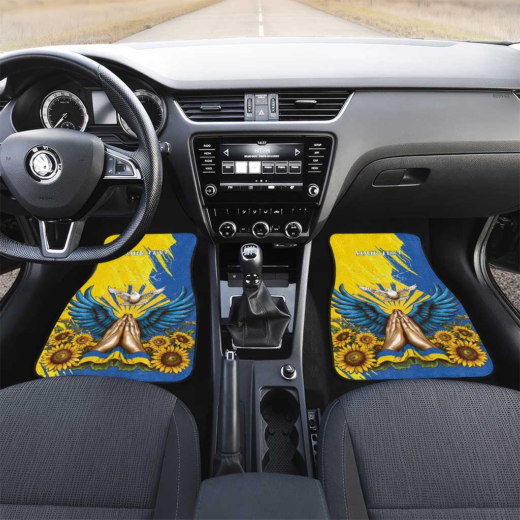 Blue car floor mats set shown in front seats with gold dove and sunflower graphics