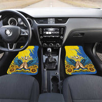 Blue car floor mats set shown in front seats with gold dove and sunflower graphics