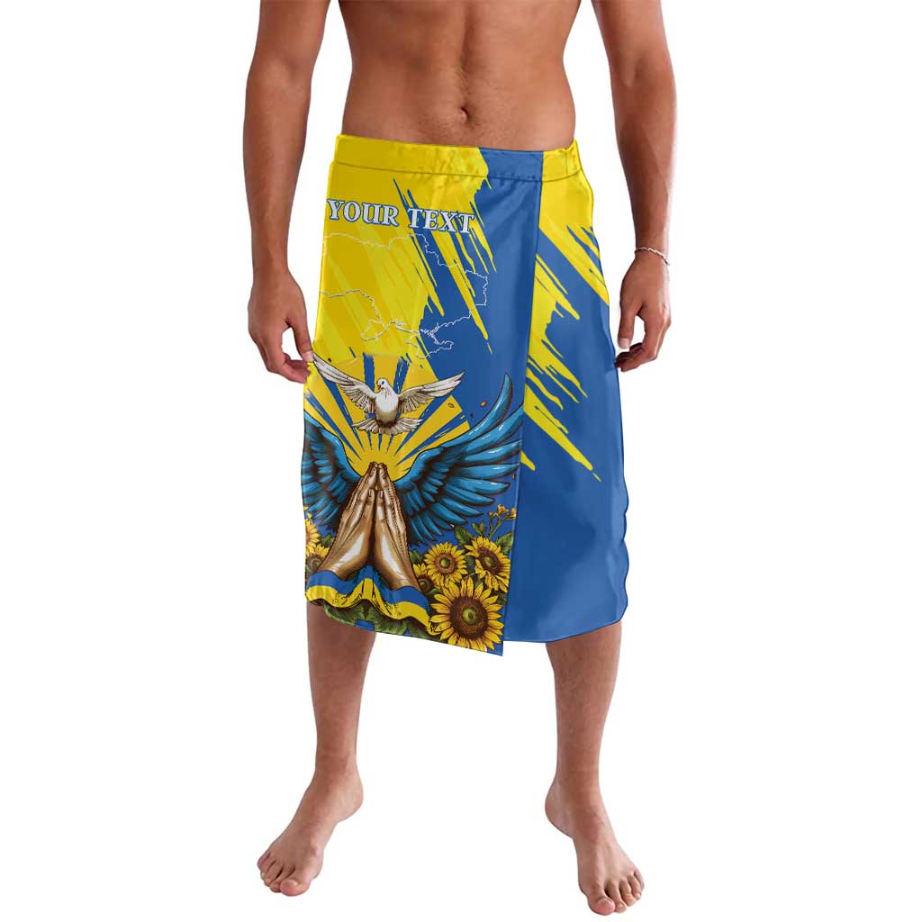 Blue and yellow lavalava skirt with dove, wings, and flower print, 'YOUR TEXT' band