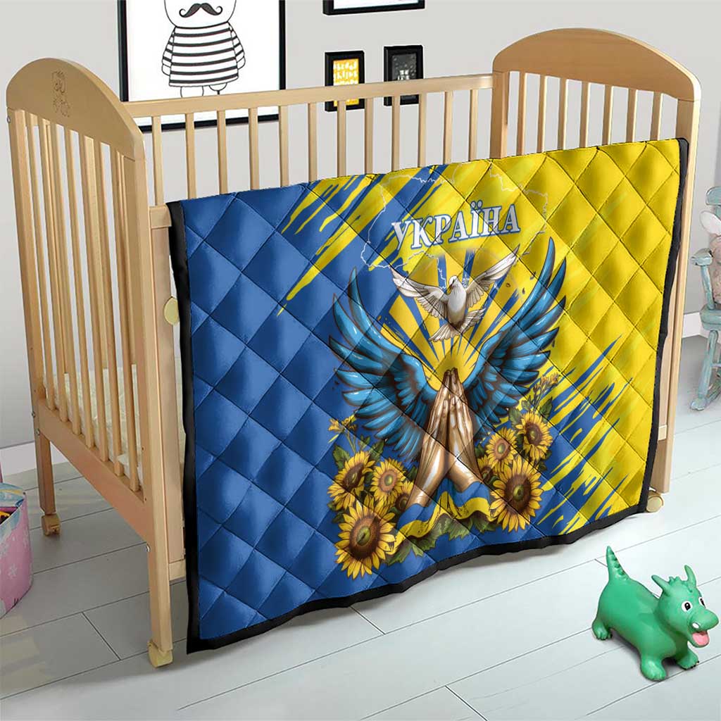 Quilt blanket with Ukrainian dove and sunflower design, blue and yellow