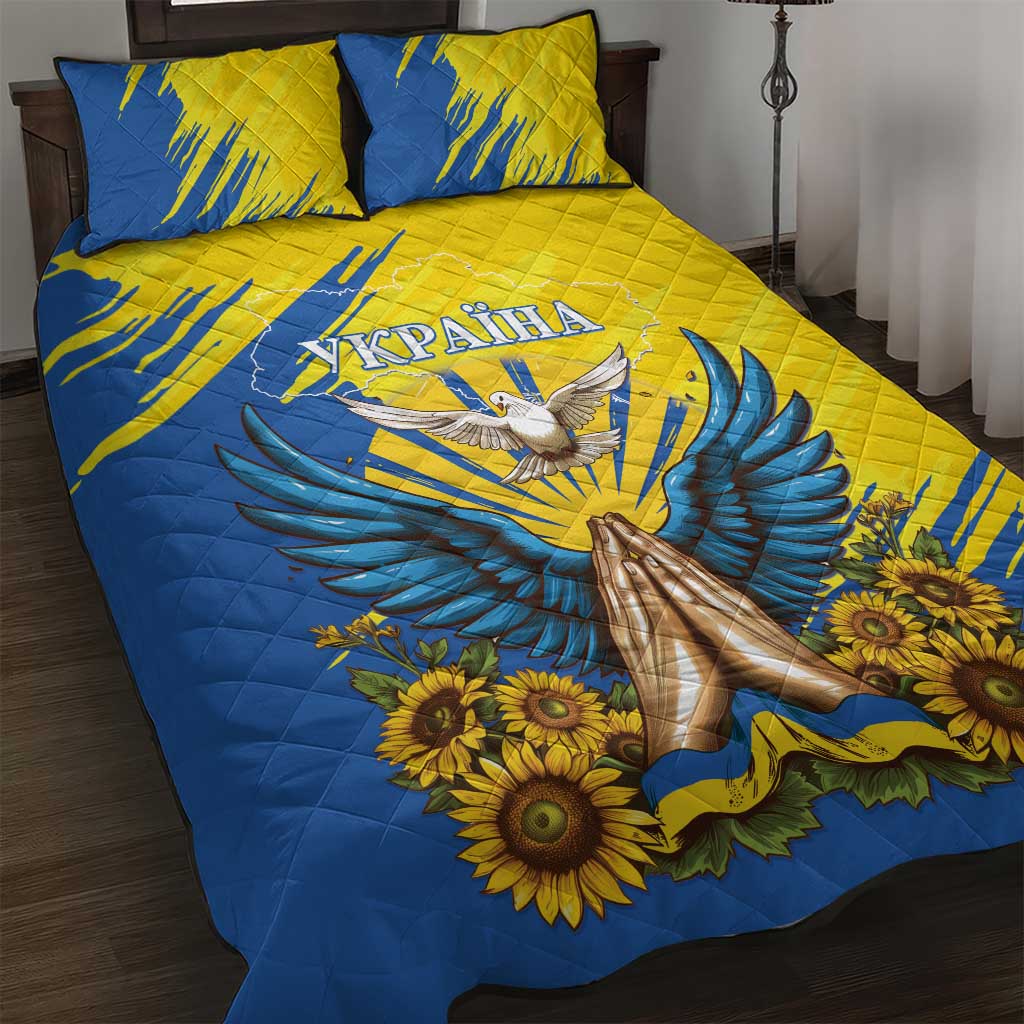 Blue and yellow quilt bed set with dove, sunflowers, Ukrainian text; includes two pillows