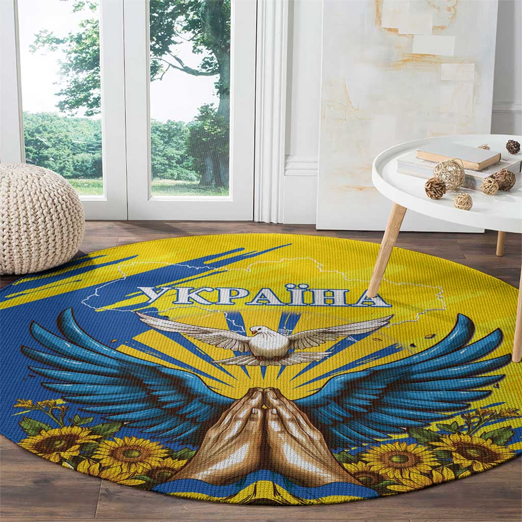 Round blue and yellow carpet with Ukrainian text, dove, praying hands, and sunflowers
