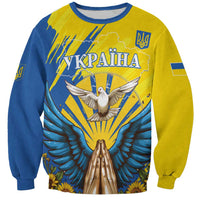 Unisex crewneck sweatshirt with dove and trident graphic, blue and yellow, long sleeves