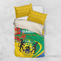 Bedding set shown flat: green and yellow duvet with emblem, red flowers, and matching pillowcases
