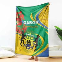 Independence day blanket featuring GABON text, green/yellow/blue flag design, black animal graphic