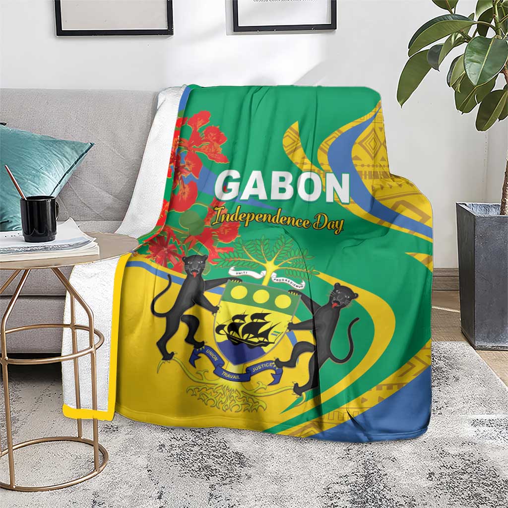 Independence day blanket with GABON text, green background, yellow center shield, blue lower curve