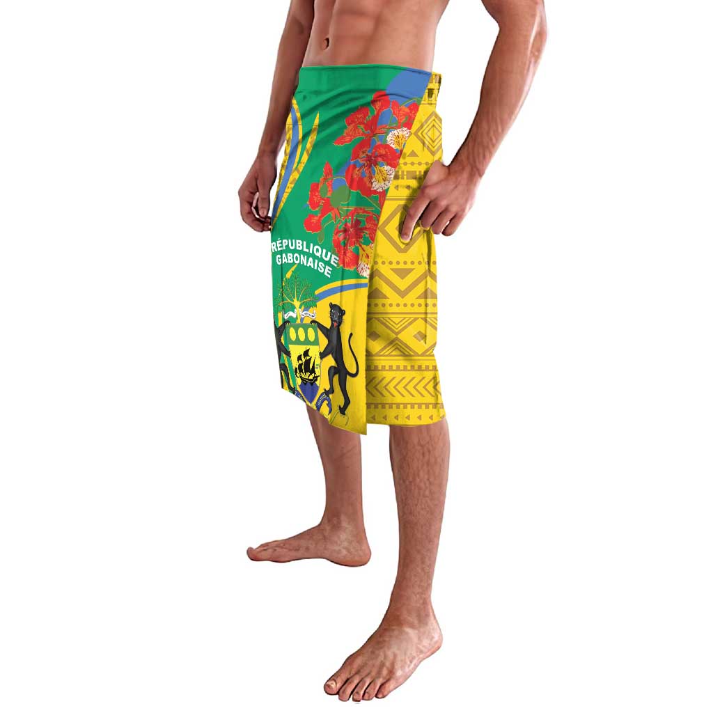 Green and yellow patterned lavalava wrap skirt with floral and emblem graphics