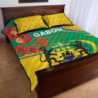 Quilt bed set with yellow patterned pillows and green-yellow quilt with lion and floral accents