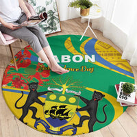 Round green rug with yellow border, black cats and central emblem, circular design