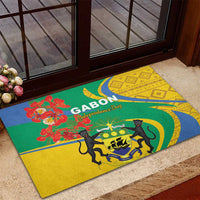 Rectangular rubber doormat with green, yellow, blue Gabon Independence Day floral and lions