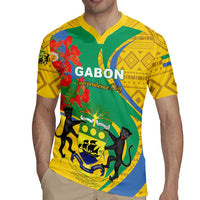 Green rugby jersey with yellow collar, Gabon emblem, cats and red floral print