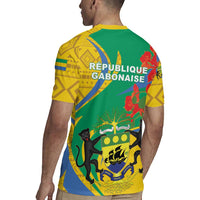 Green rugby jersey with yellow trim, Republique Gabonaise text and emblem on back