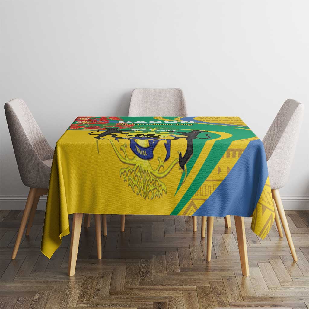 Patterned square tablecloth in yellow with green and blue decorative shapes