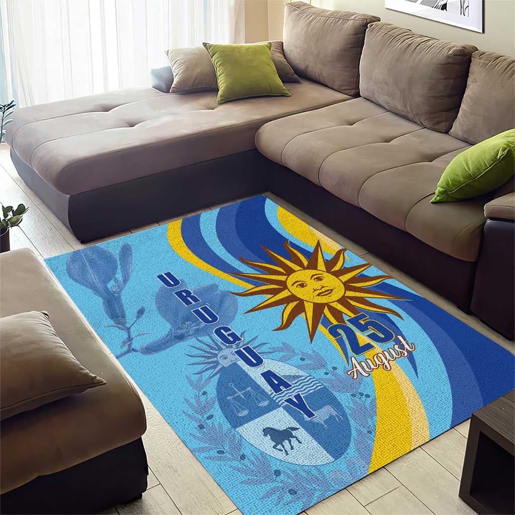 Blue rectangular rug featuring golden sun, large “25” and “August” script lettering