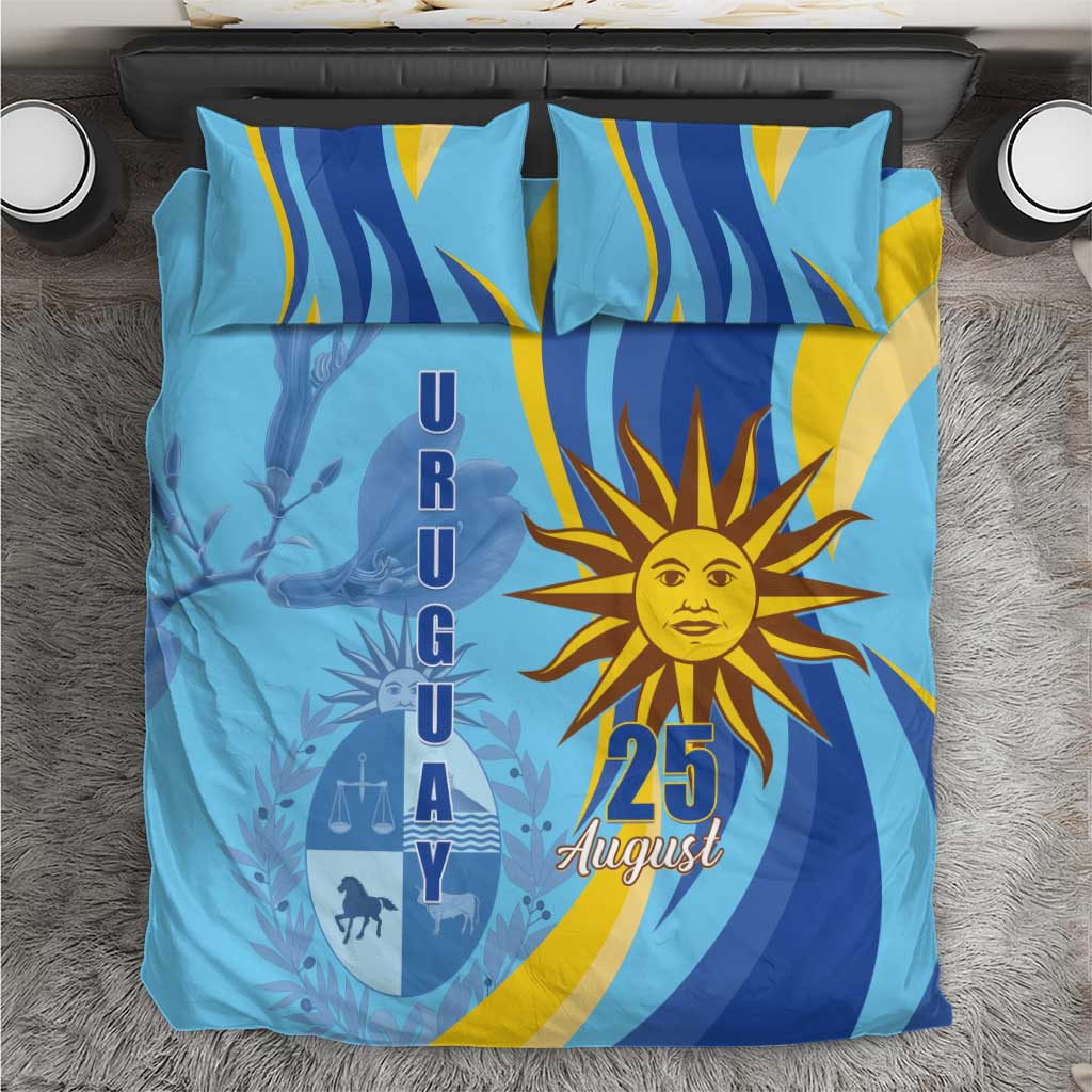 Blue bedding set with sun emblem and 25 August graphic, with matching pillowcases