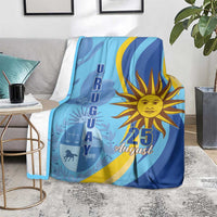 Blue Uruguay Independence Day blanket on chair, sun "25 August" and scale silhouette art