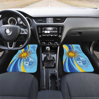 Blue car floor mat set for front seats with sun emblem and wave pattern