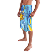 Blue printed lavalava sarong with Uruguay-themed crest and yellow sun graphic