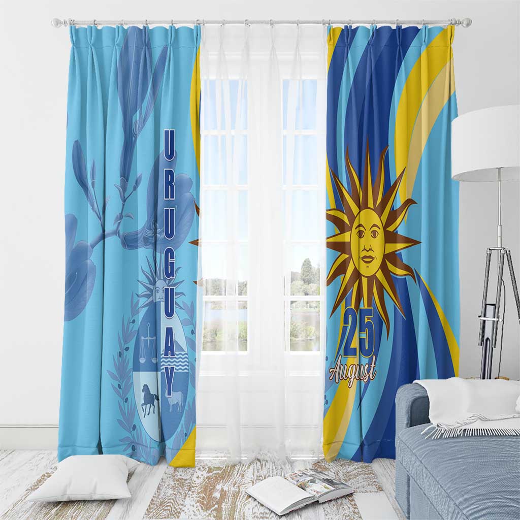 Blue window curtain set with sun face and “25 August” text, plus “URUGUAY” vertical panel.
